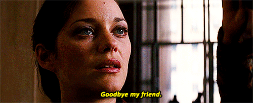 A woman saying "Goodbye, my friend"